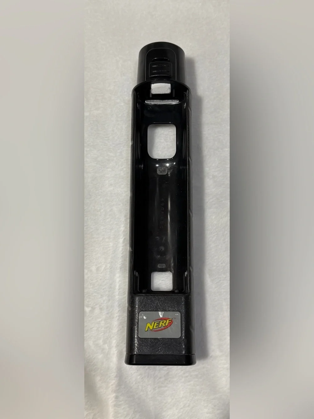 Nintendo Wii console with 2 remotes, 1 silicone sleeve & Nerf sports attachments